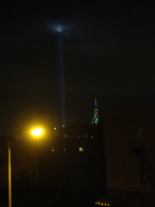 The Freedom Tower and the pillars of Light from Ground Zero, as seen from my apartment window, 9/11/14